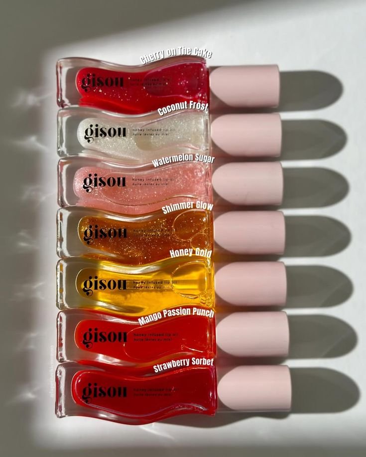 GISOU Honey Infused Lip Oil - elegant packaging with nourishing honey-infused care for lips
