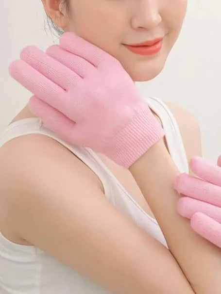 Woman wearing SGS SPA Gel Gloves - Luxury hand care treatment for nourished and radiant hands

